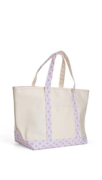 Natural coated canvas TRVL maxi tote with pink petite fleur floral trim