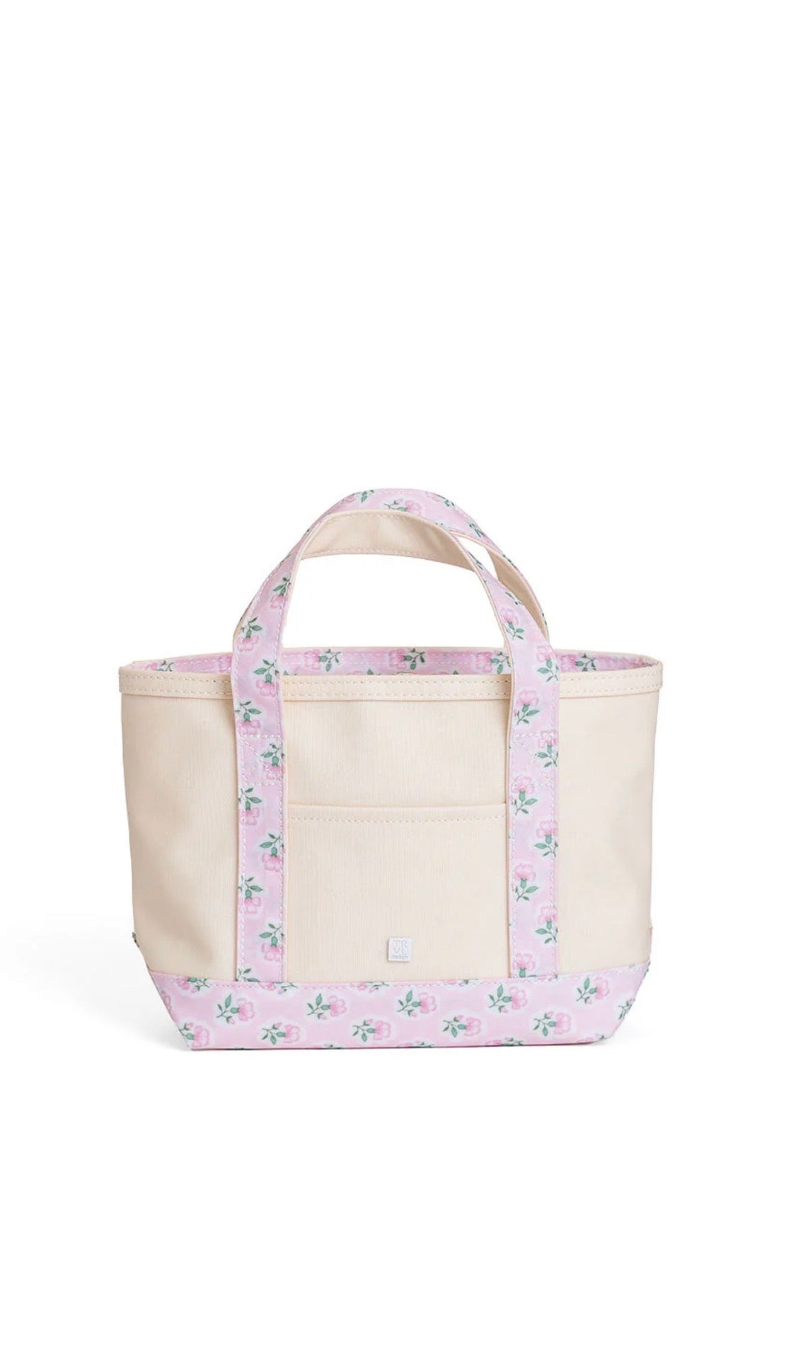Natural coated canvas TRVL mini tote with pink petite fleur floral trim