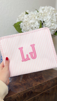 Pink Pimlico stripe TRVL Roadie pouch embroidered with 'LJ' initials in applique letters