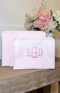 Pink Pimlico stripe TRVL Roadie pouch, available in medium and large