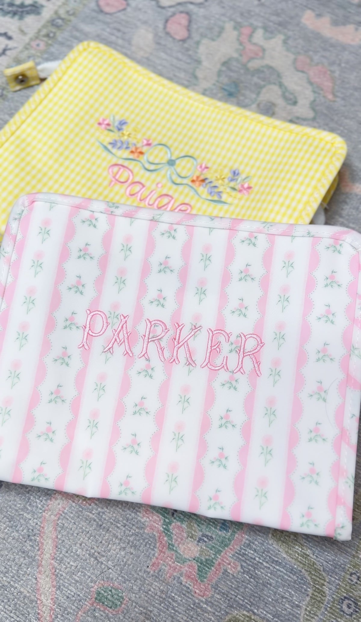 Pink ribbon floral roadie embroidered with the name Parker