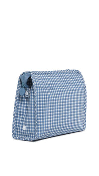 Blue gingham check toiletry bag on a white background