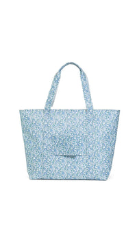 A blue Hamptons floral jumbo tote bag with two handles and a front exterior pocket.