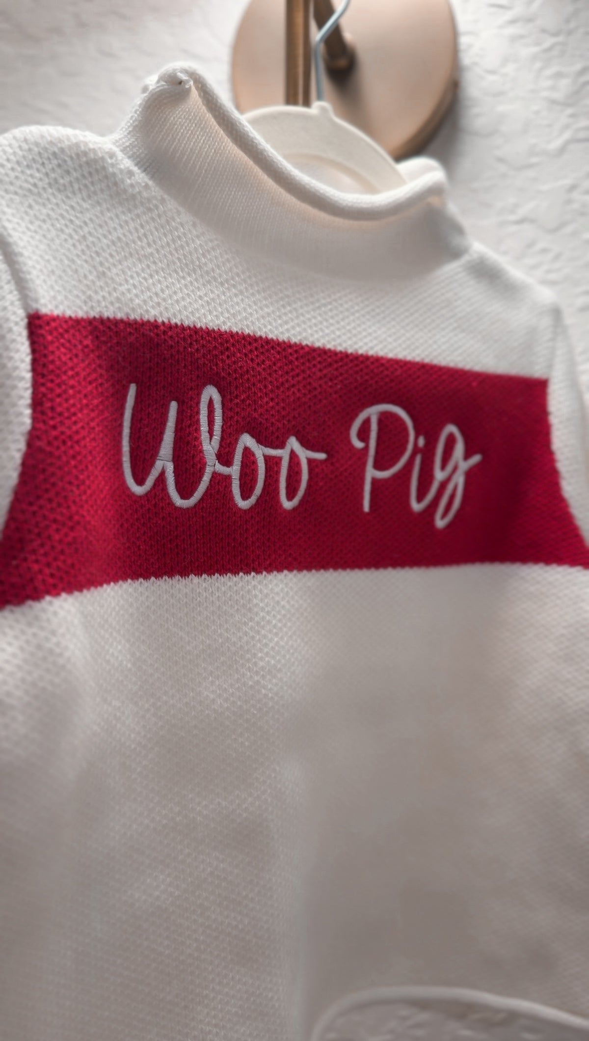 White and red rollneck sweater for baby