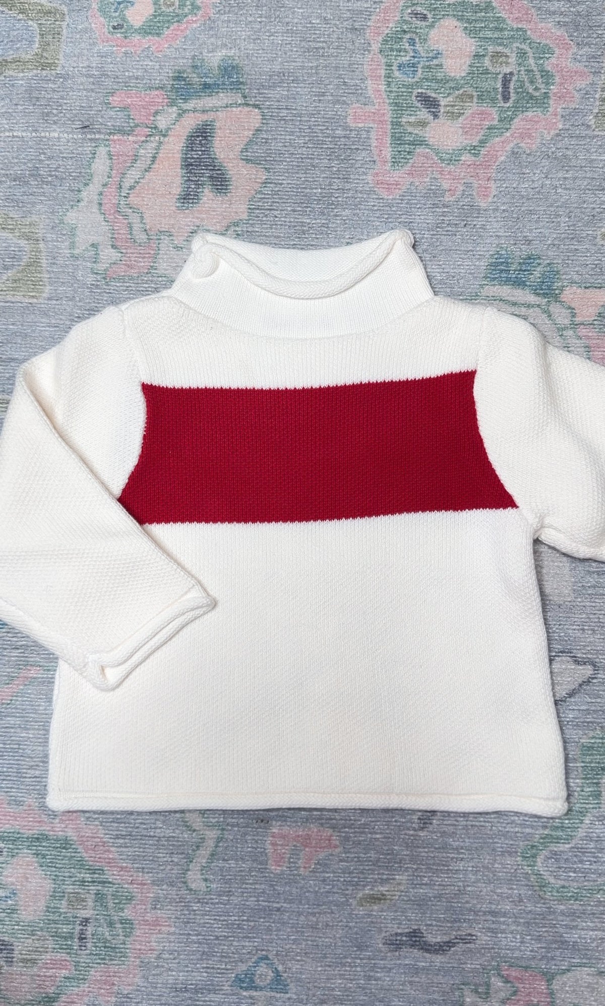 White and red rollneck sweater for baby